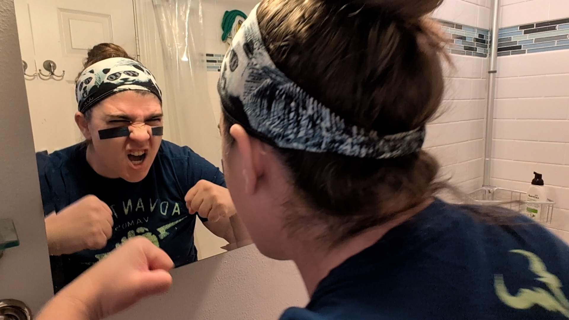 Jazz looking distressed in a car flipping on its side